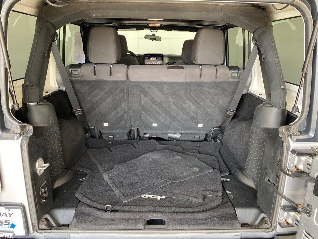 Used 2016 Billet Silver Metallic Clearco Jeep Unlimited Sport image 14