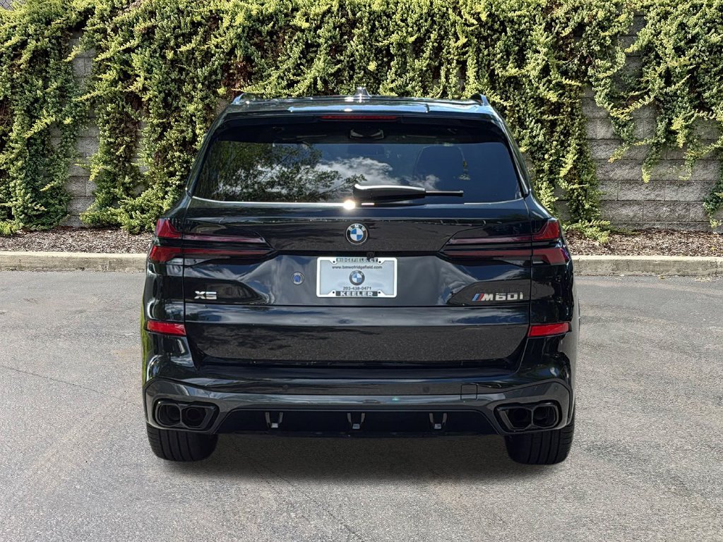 Used 2026 Black Sapphire Metallic BMW M60i image 5