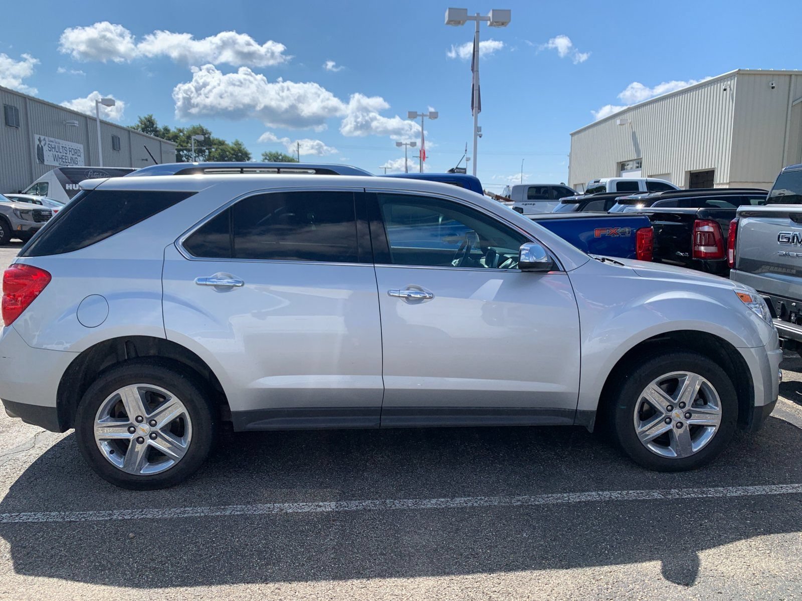 Used 2015 SILVER ICE METALLIC Chevrolet LTZ image 2