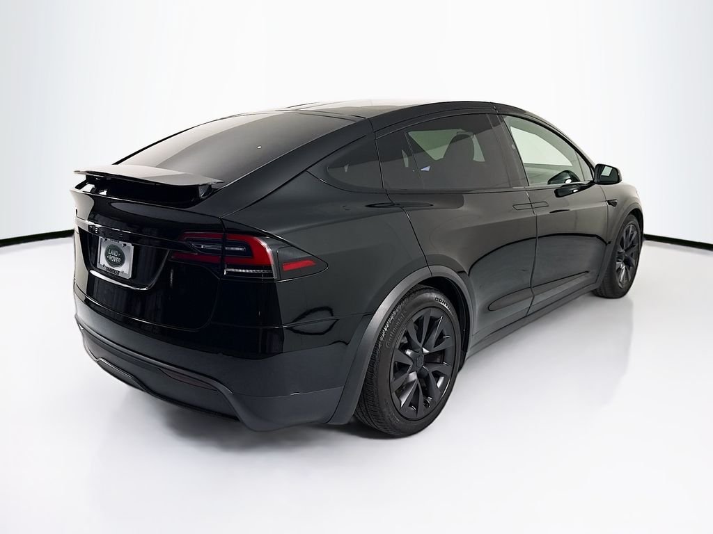 Used 2023 Solid Black Tesla  image 5
