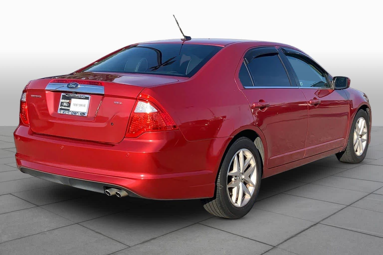 Used 2011 Red Candy Metallic Tinted Ford SEL image 11