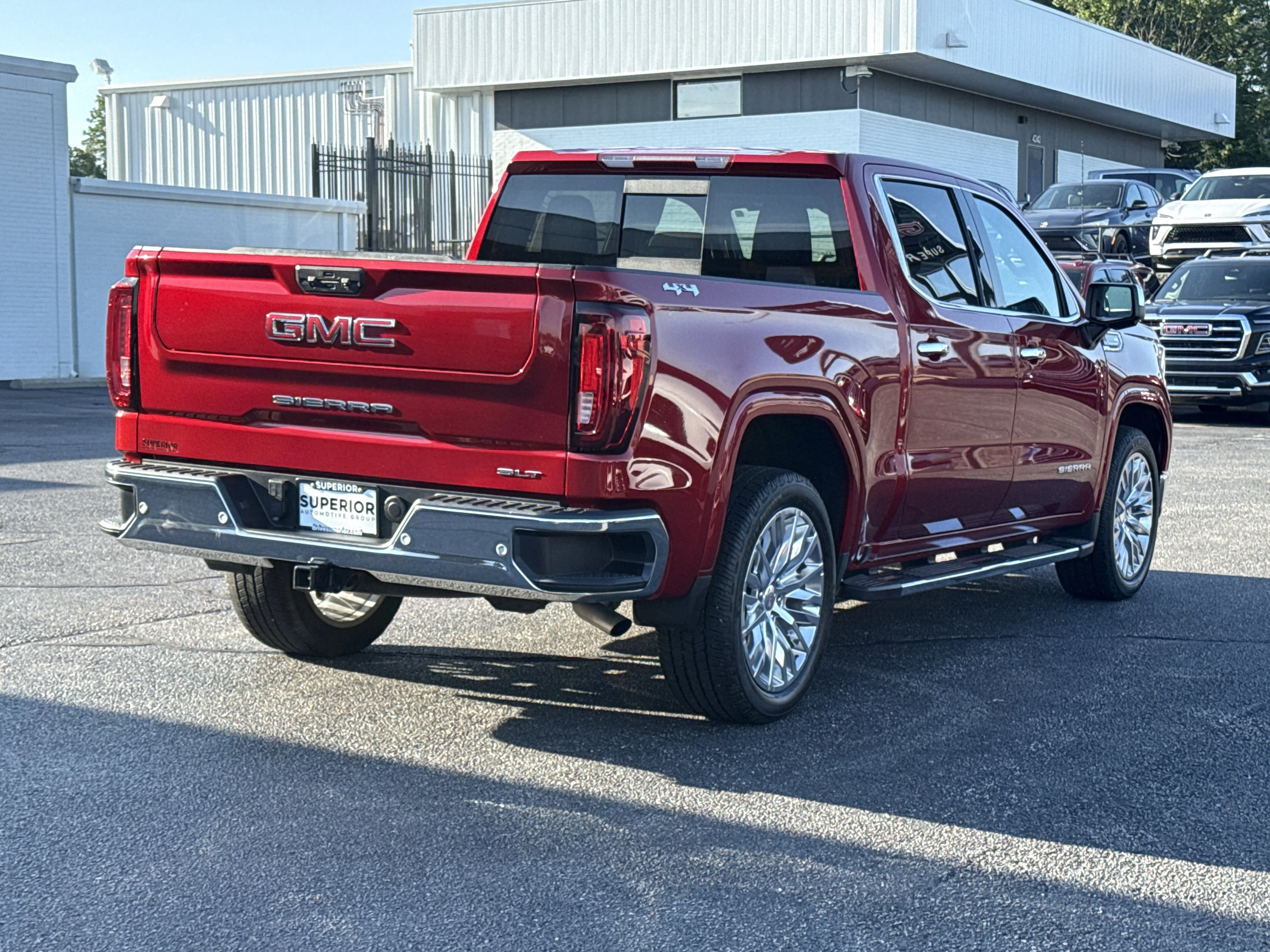 Used 2024 Volcanic Red Tintcoat GMC SLT 4WD image 2