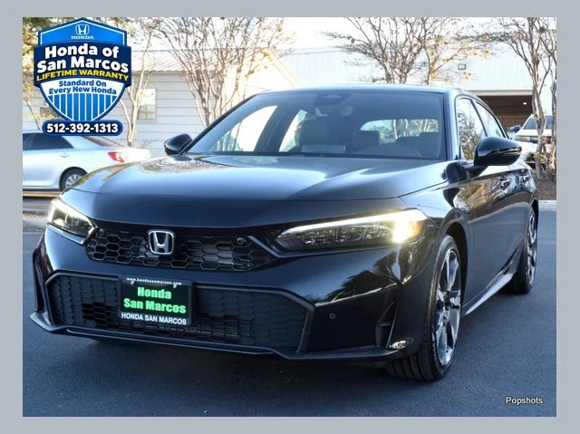 New 2026 Crystal Black Pearl Honda FWD Touring Hybrid image 1