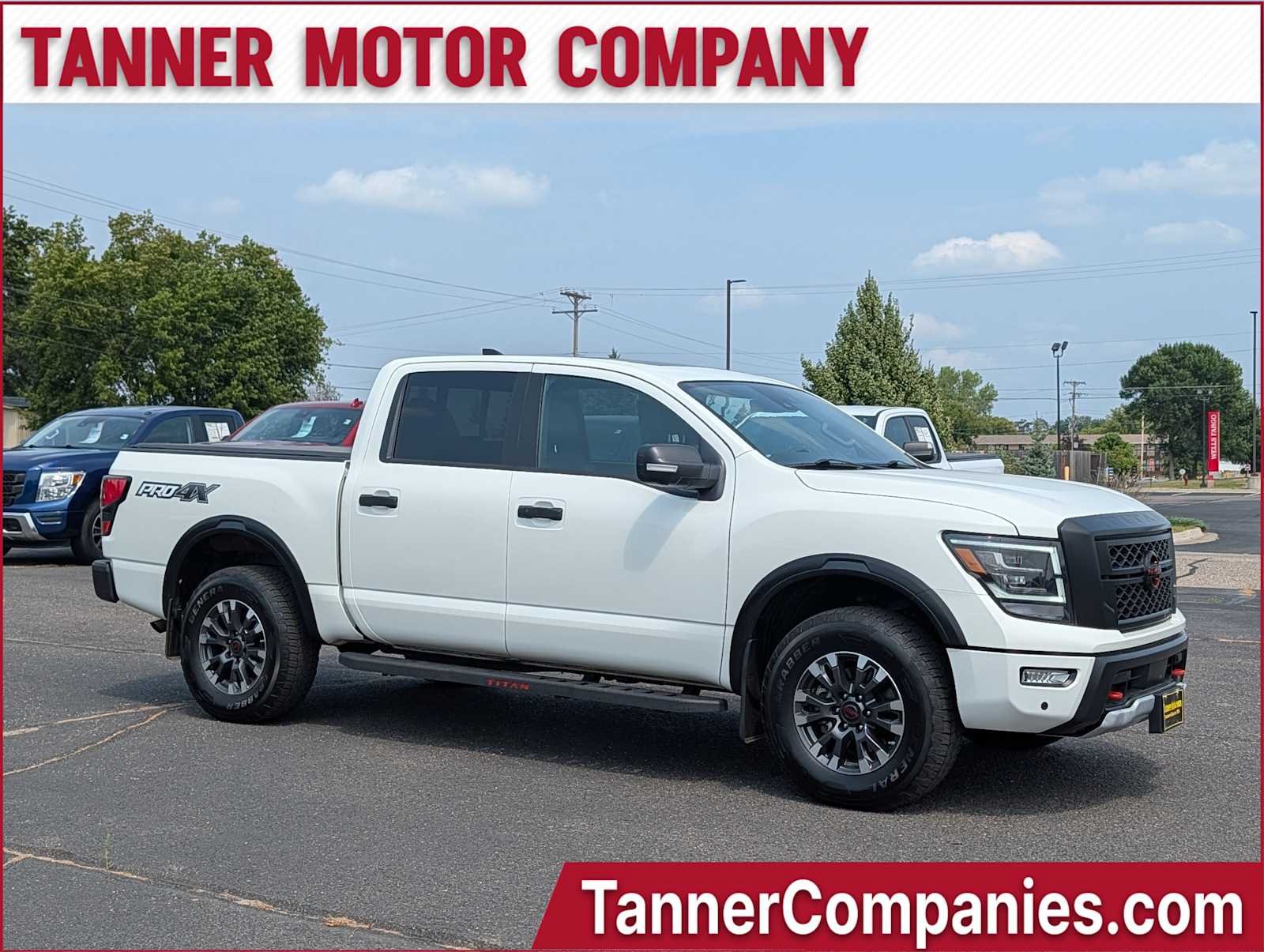 Glacier White 2024 Nissan Titan Pickup Truck Four-Wheel Drive