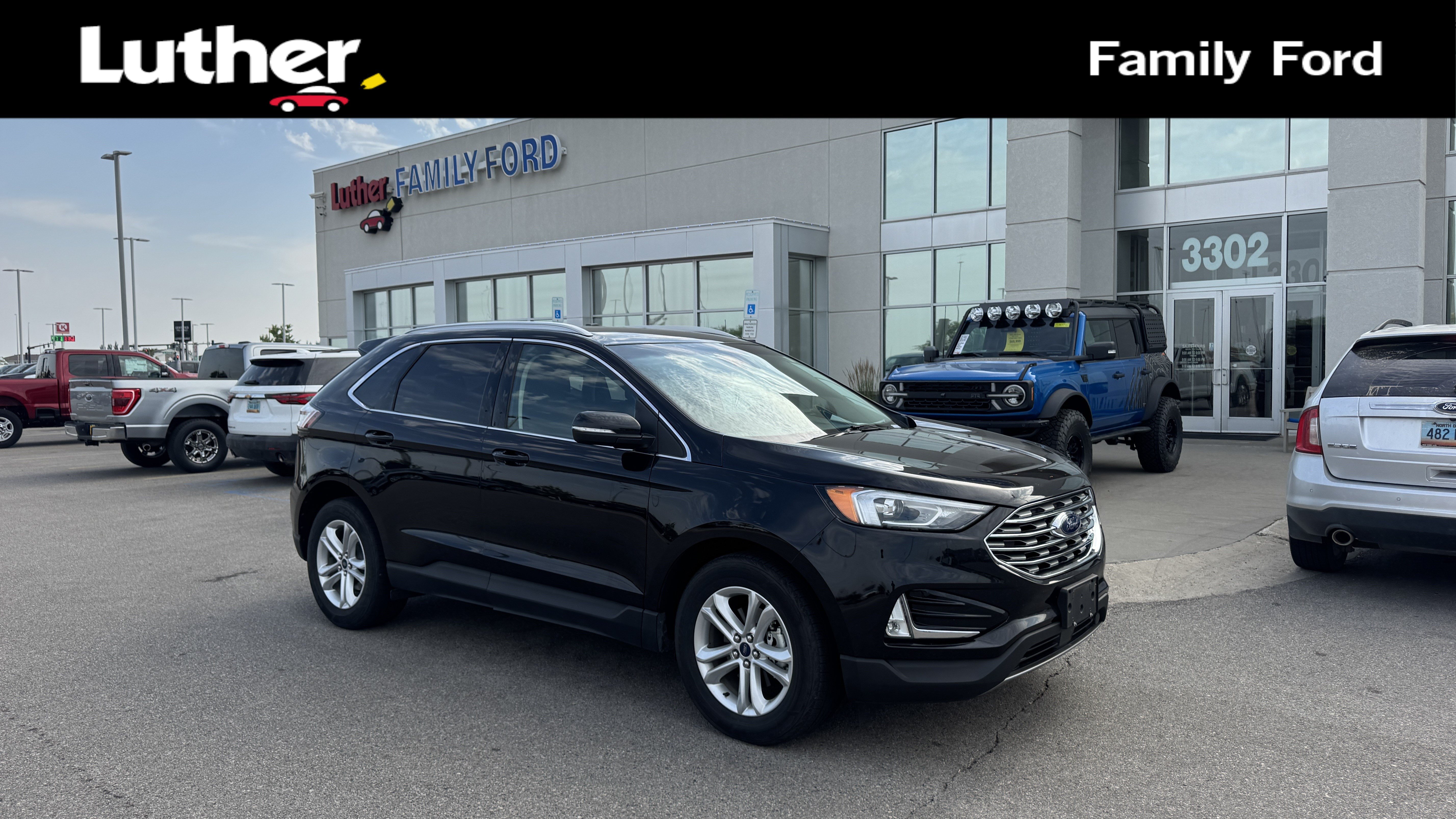 Used 2019 Agate Black Metallic Ford SEL image 1