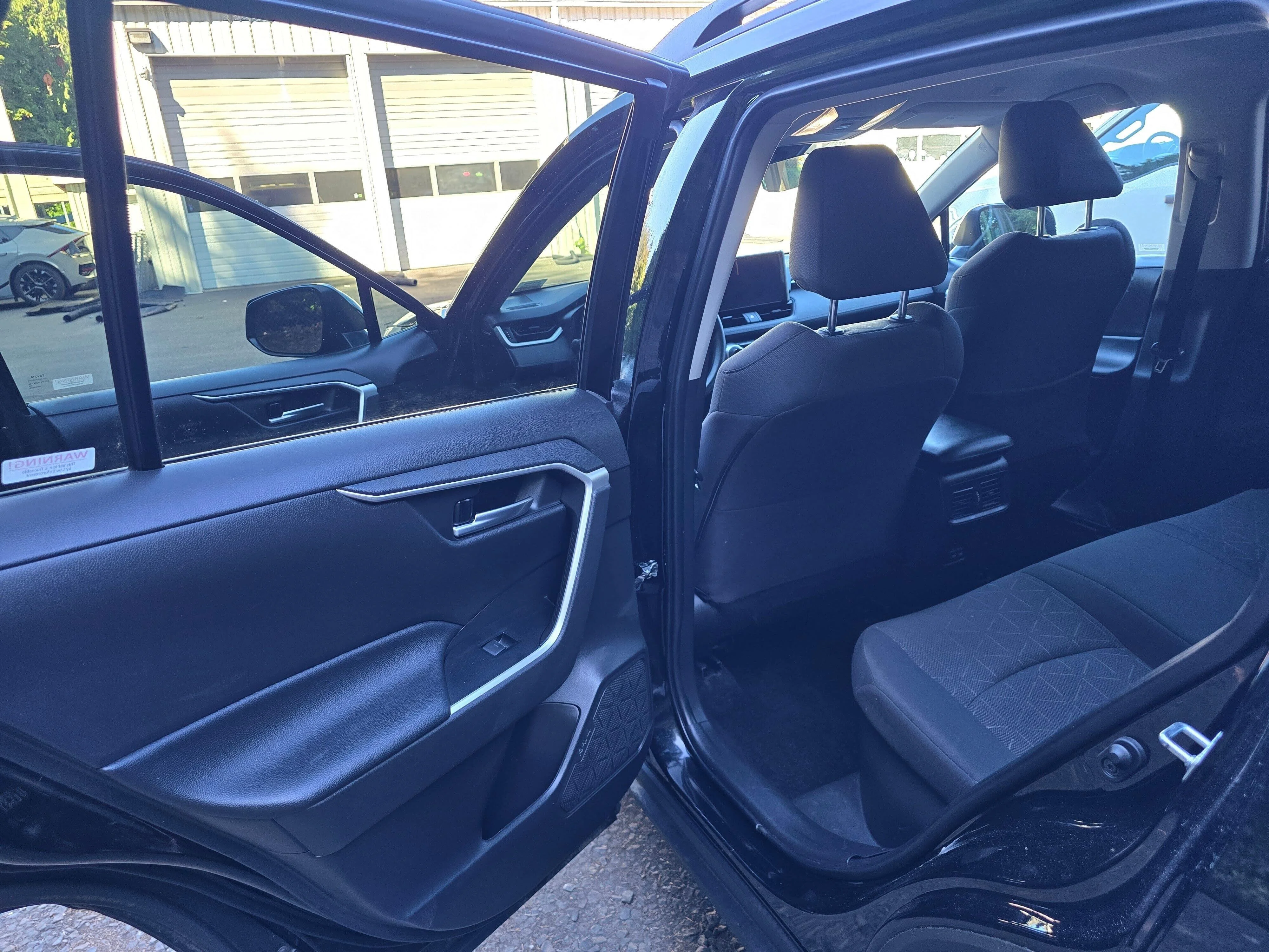 Used 2024 Midnight Black Metallic Toyota Woodland Edition image 10