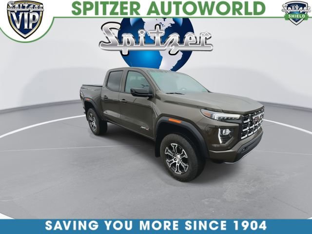Used 2025 Deep Bronze Metallic GMC AT4 image 2