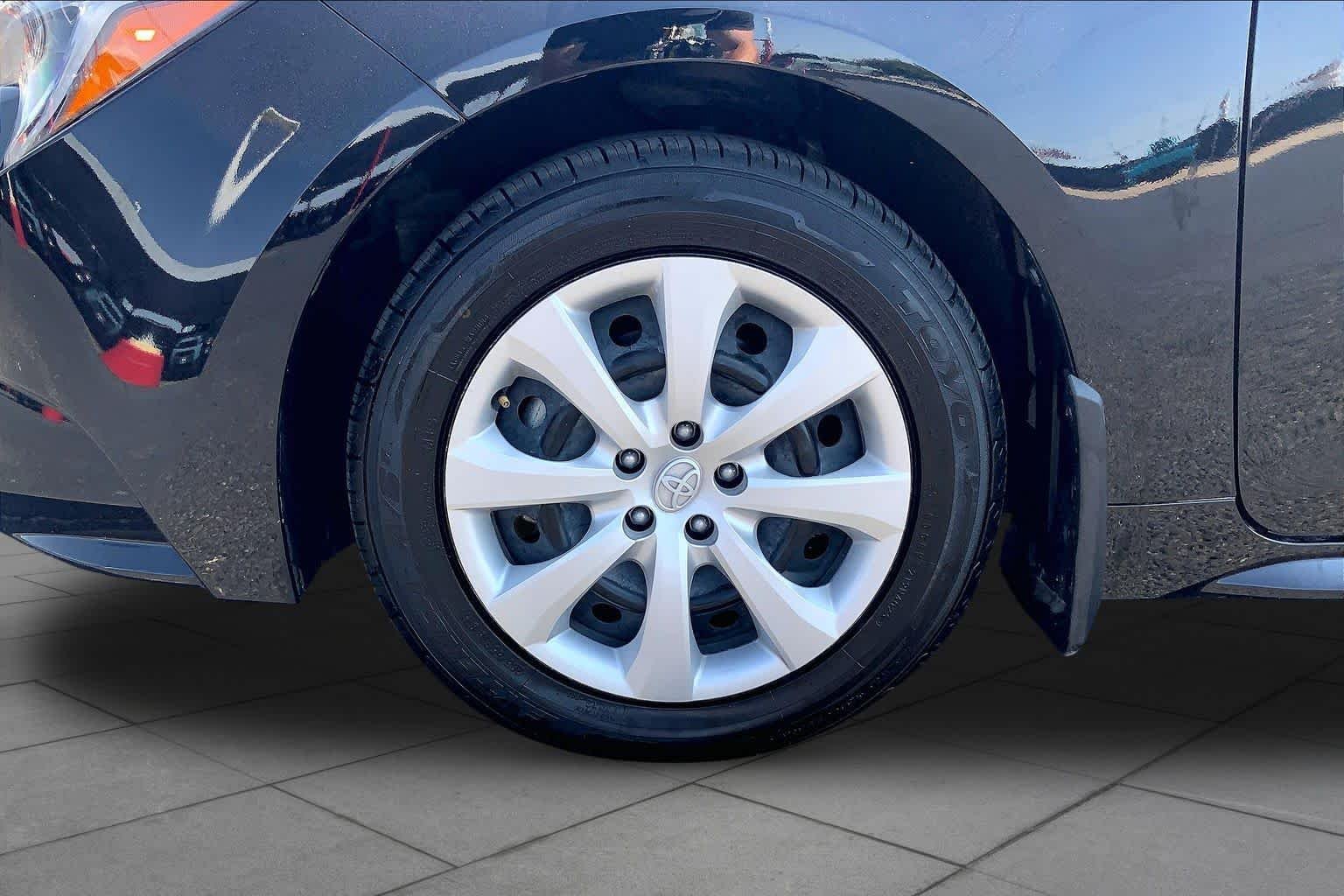 Used 2026 Midnight Black Metallic Toyota Hybrid LE image 11