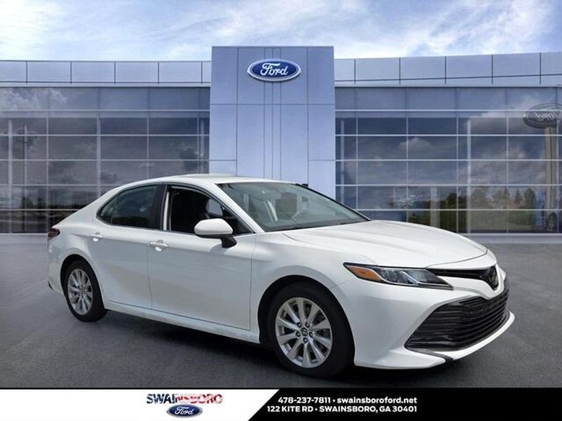 Used 2019 Super White Toyota LE image 1