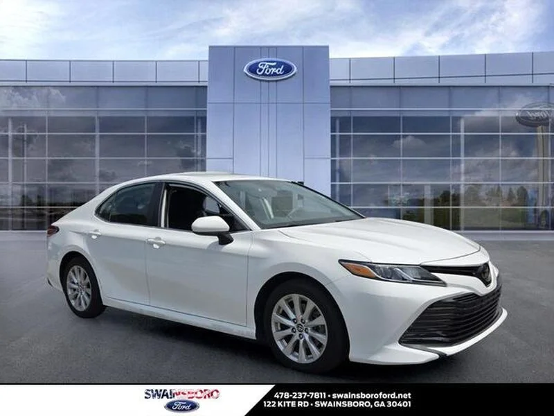 Used 2019 Super White Toyota LE image 1