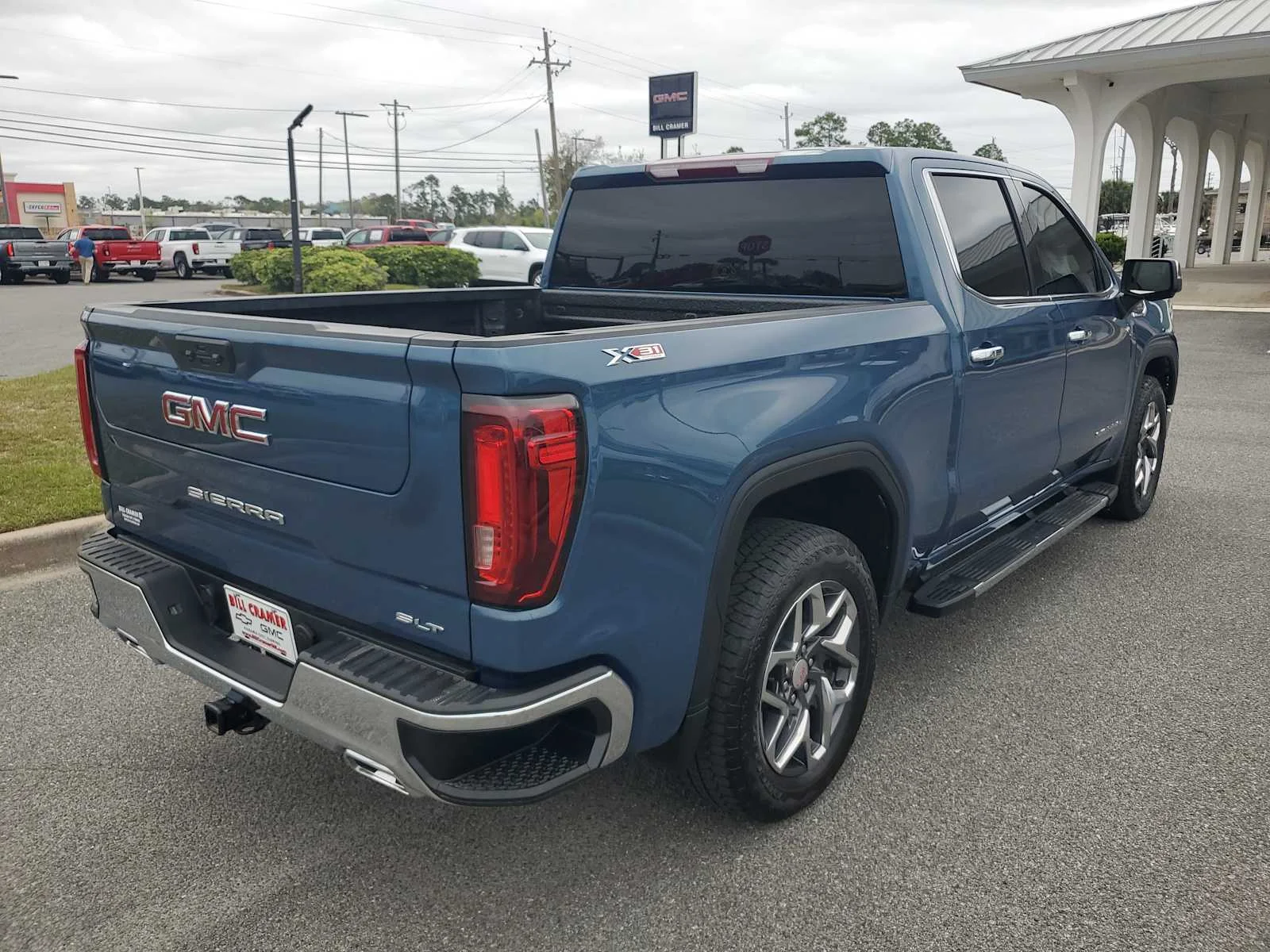Used 2024 Downpour Metallic GMC SLT image 6