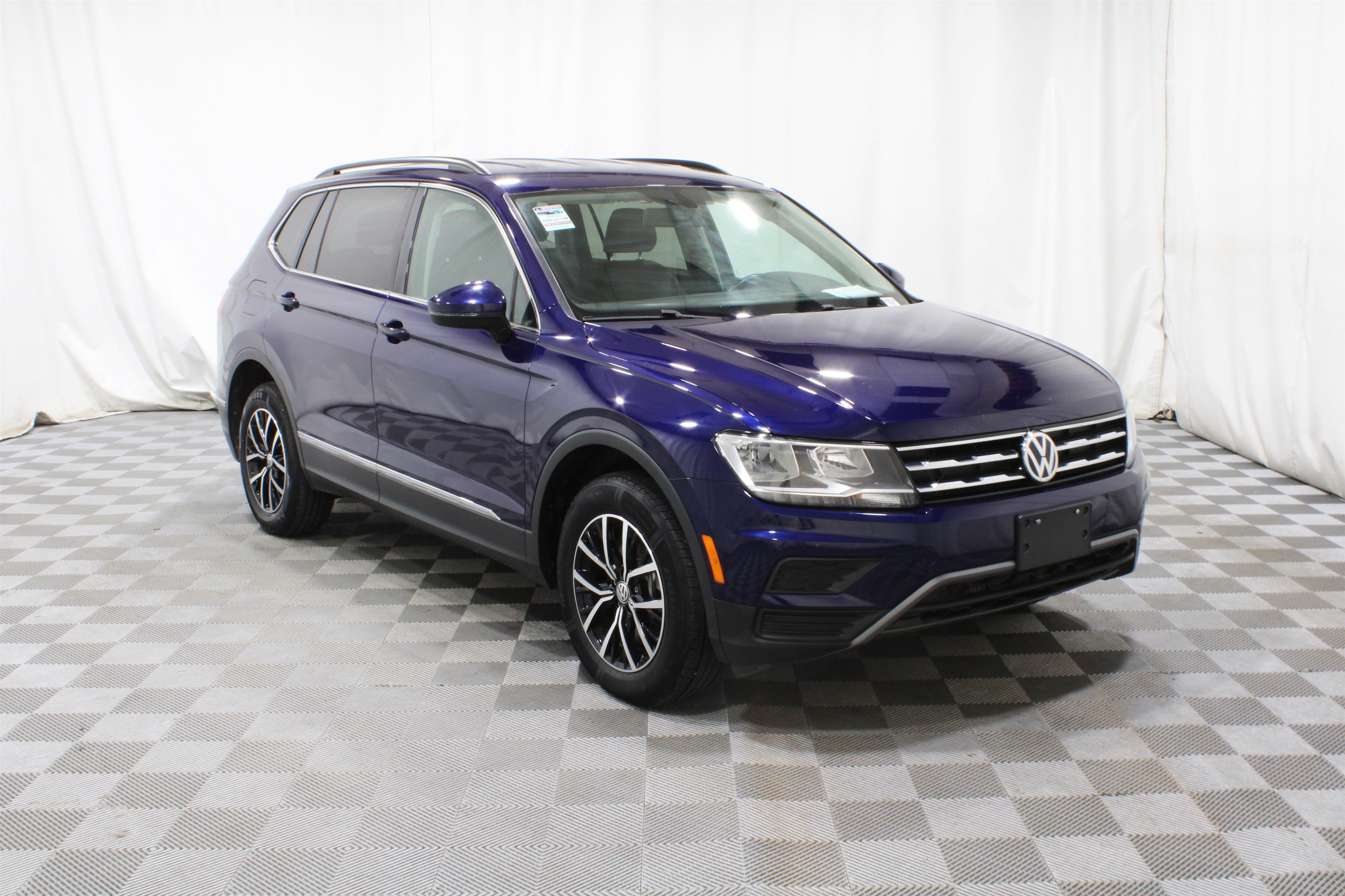 Used 2021 Atlantic Blue Metallic Volkswagen SE image 1