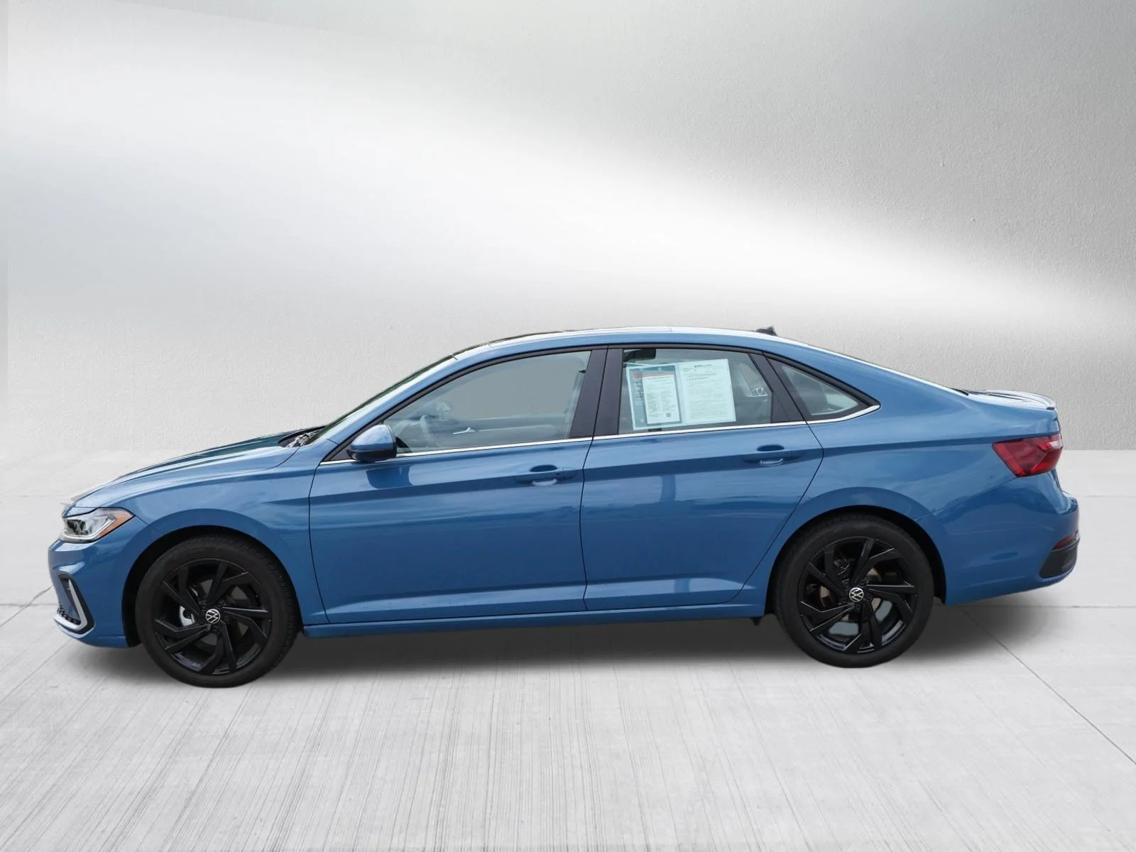 Certified Used 2025 Monterey Blue Volkswagen SE image 4