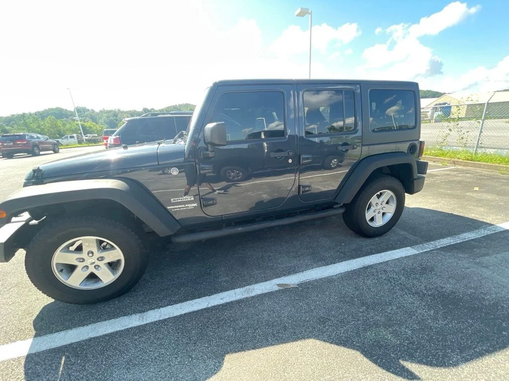 Used 2018 Black Jeep Unlimited Sport image 3