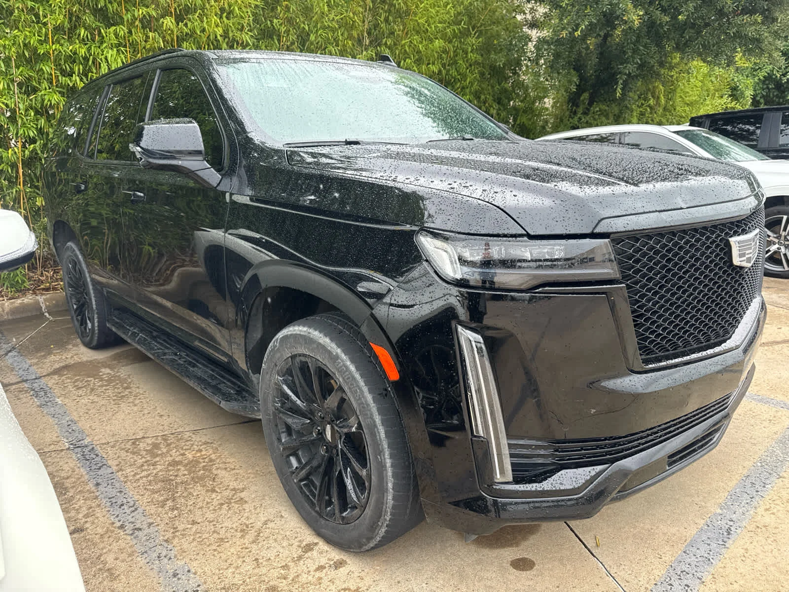 Used 2024 Black Raven Cadillac 4WD Sport image 2