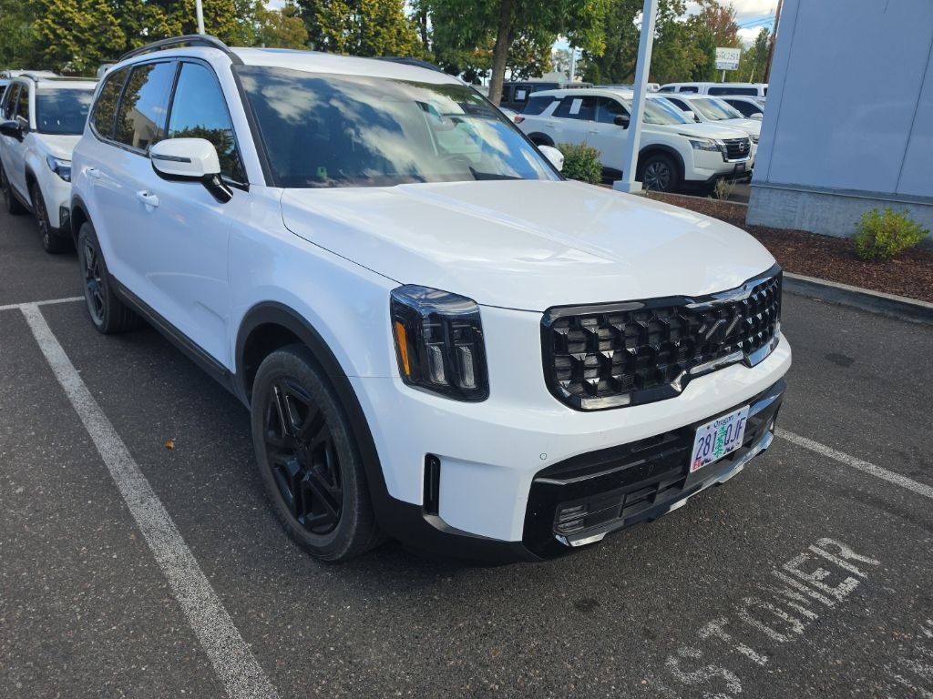 Certified Used 2025 White Pearl Kia SX-Prestige X-Line image 1