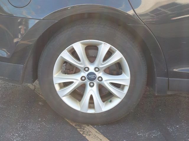 Used 2011 Tuxedo Black Metallic Ford SEL image 8