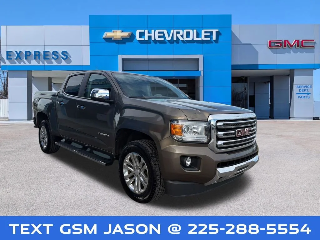 Used 2016 BRONZE ALLOY METALLIC GMC 4WD SLT image 1