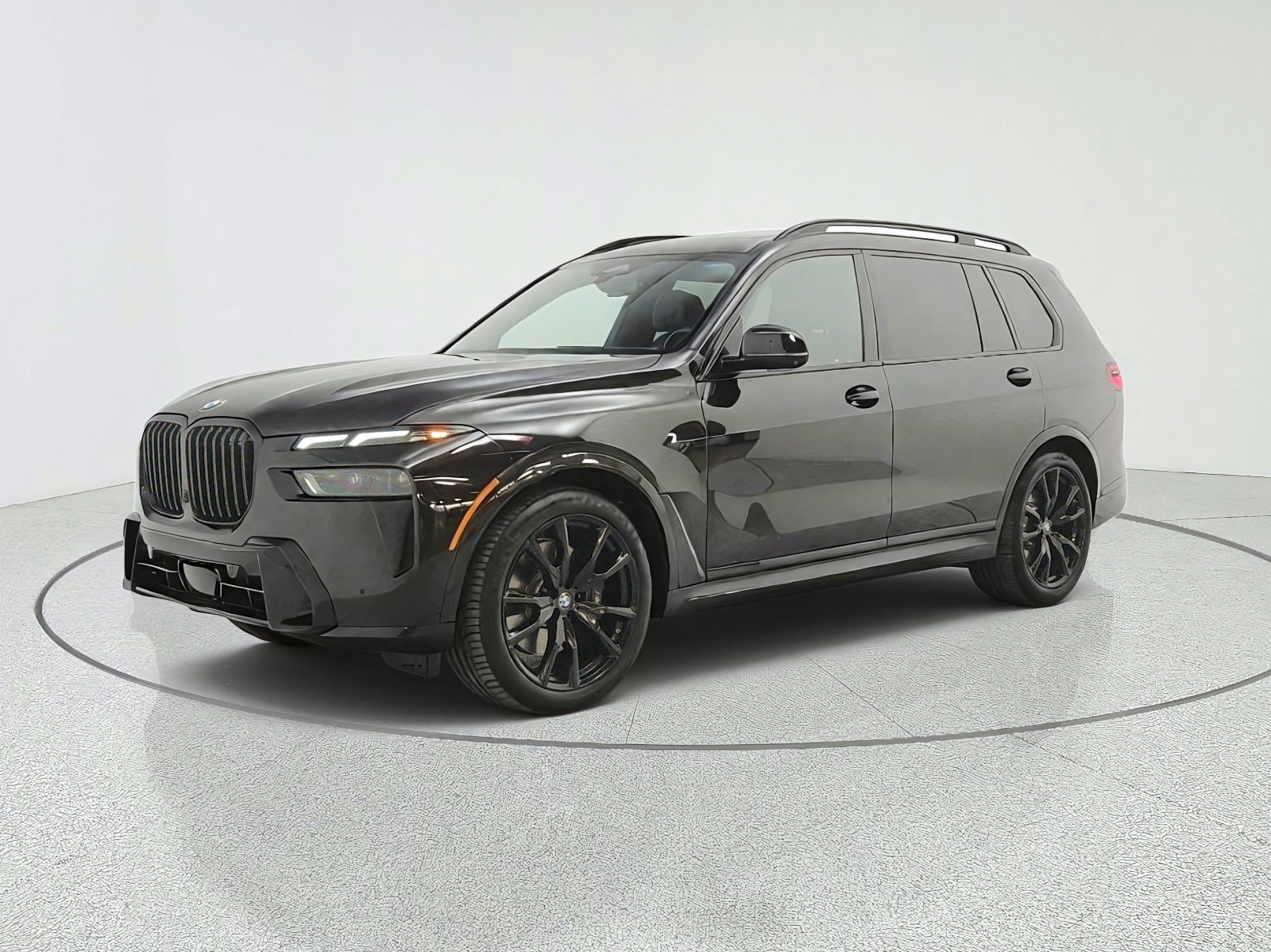 Used 2024 Black Sapphire Metallic BMW xDrive40i Sports Activity Vehicle image 1