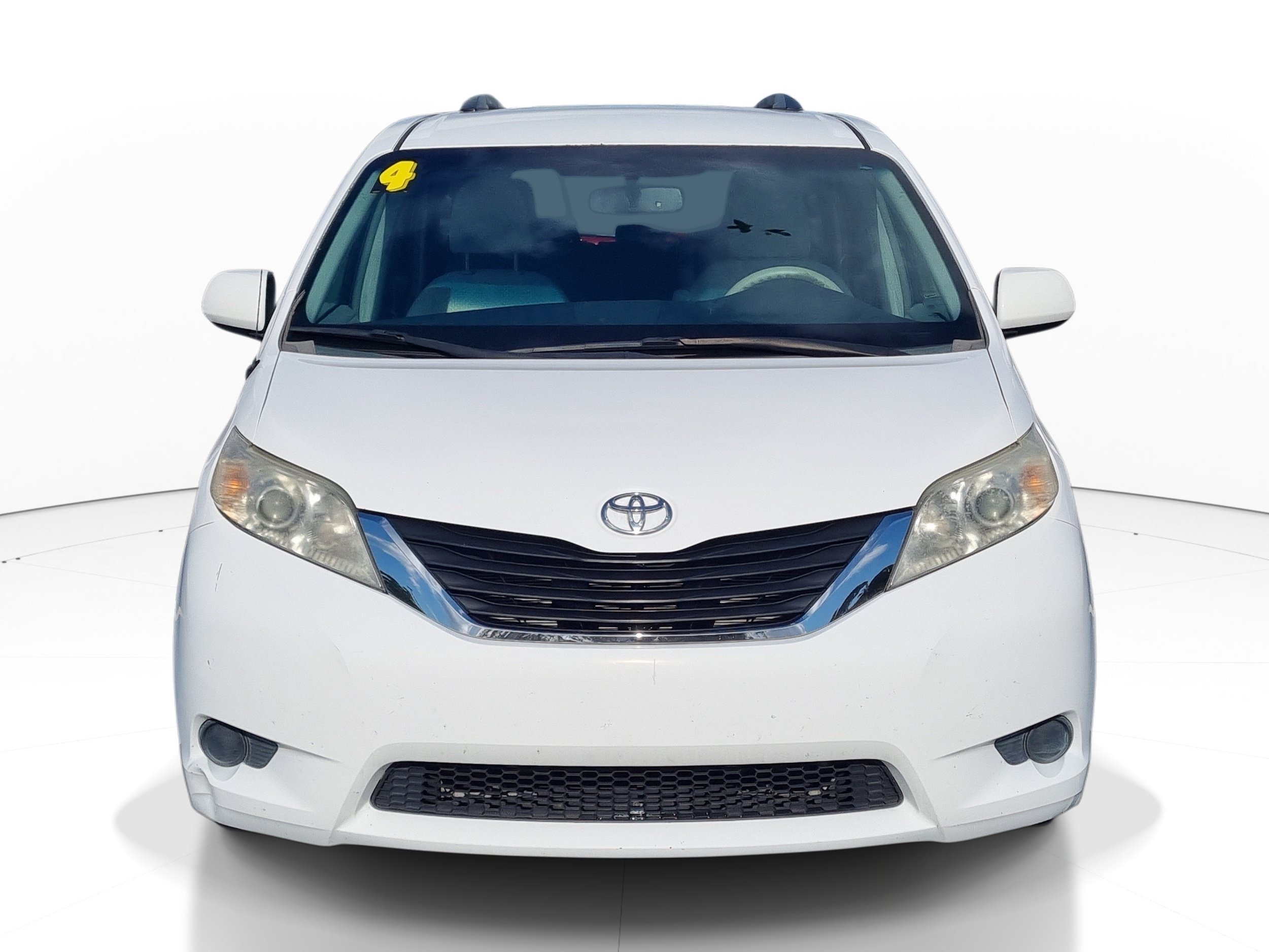 Used 2014 Super White Toyota LE image 1