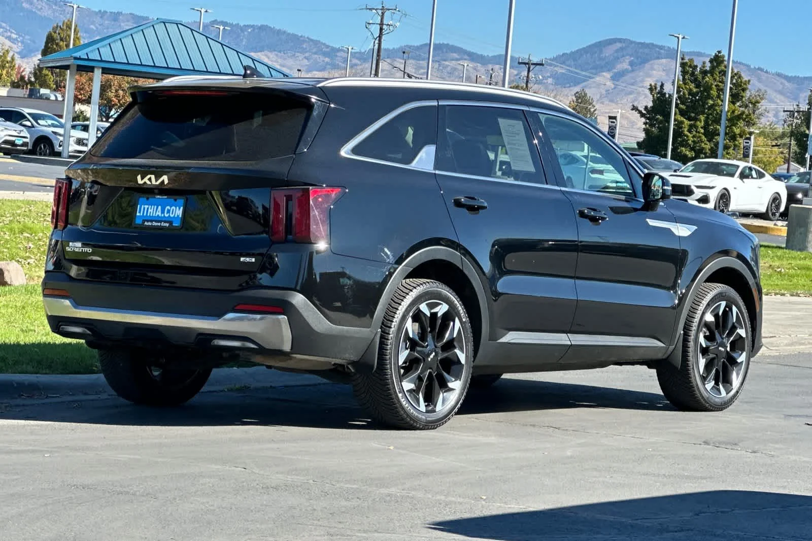 Certified Used 2025 Black Kia EX image 2