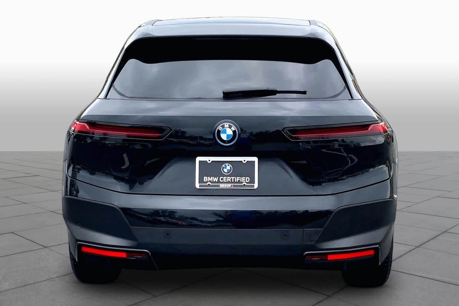 Used 2024 Black Sapphire Metallic BMW xDrive50 image 4