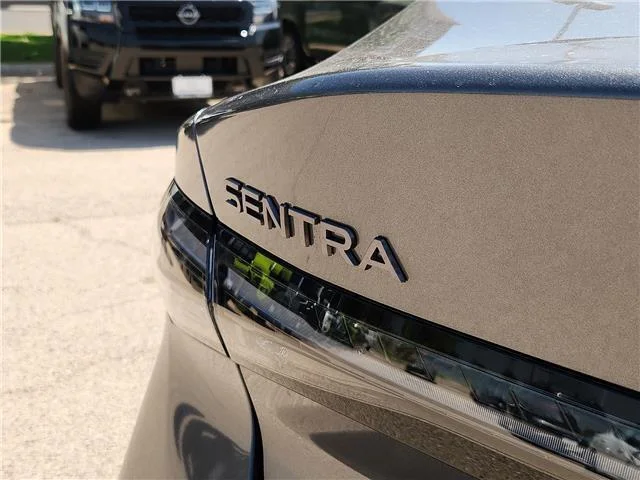 New 2026 KAD Gun Metall Nissan SV Sedan image 6