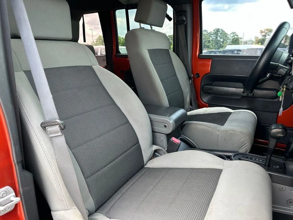 Used 2009 Orange Jeep Unlimited X image 22