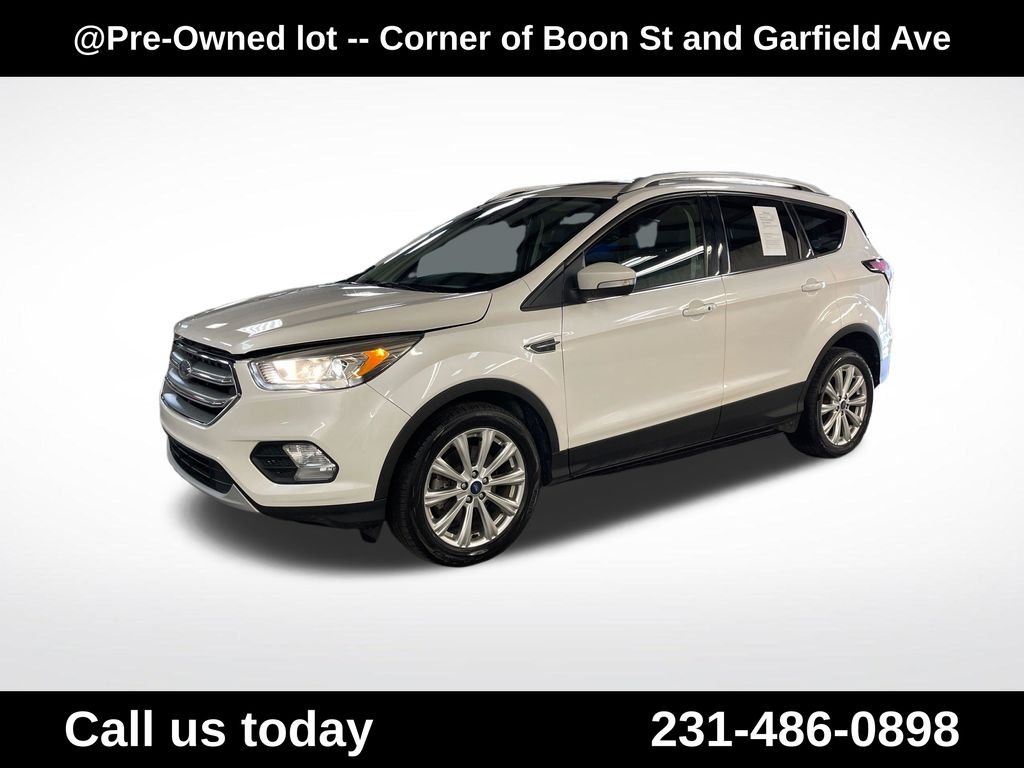 Used 2017 Ford Escape Titanium with VIN 1FMCU0J95HUE46403 for sale in Traverse City, MI
