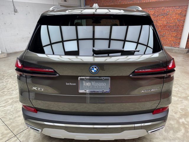New 2026 Green BMW xDrive50e image 4