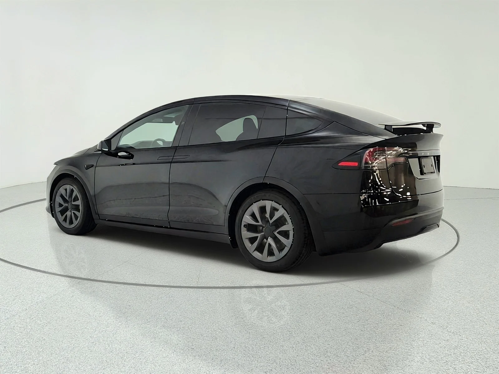 Used 2024 Solid Black Tesla AWD image 7