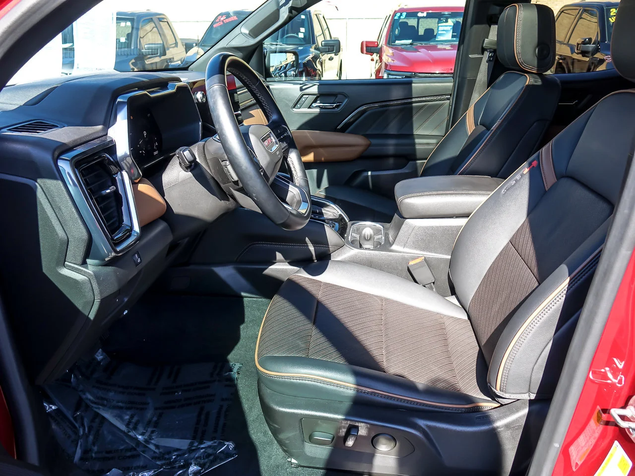 Used 2024 Volcanic Red Tintcoat GMC 4WD AT4 image 9