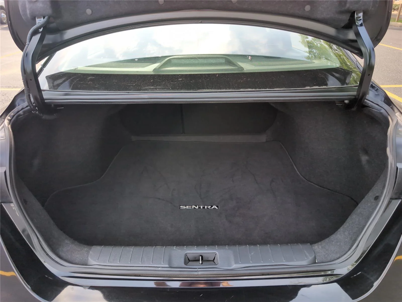 Used 2024 Super Black Nissan SV image 6