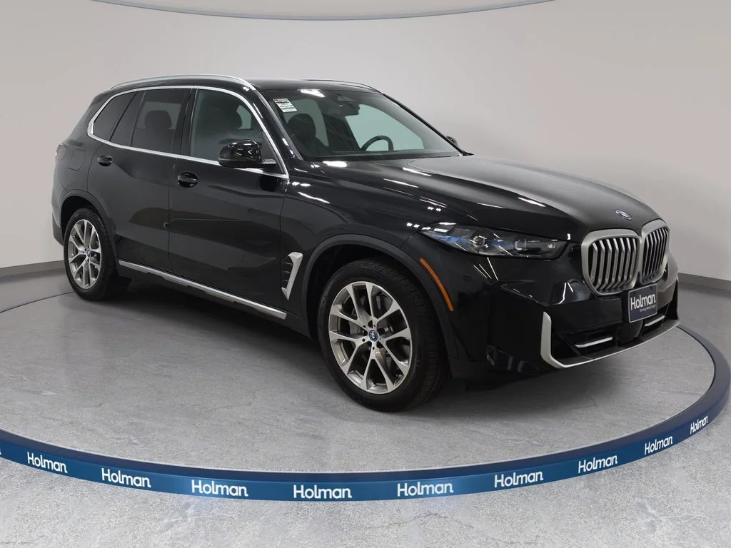 Used 2025 Black Sapphire Metallic BMW xDrive50e image 4