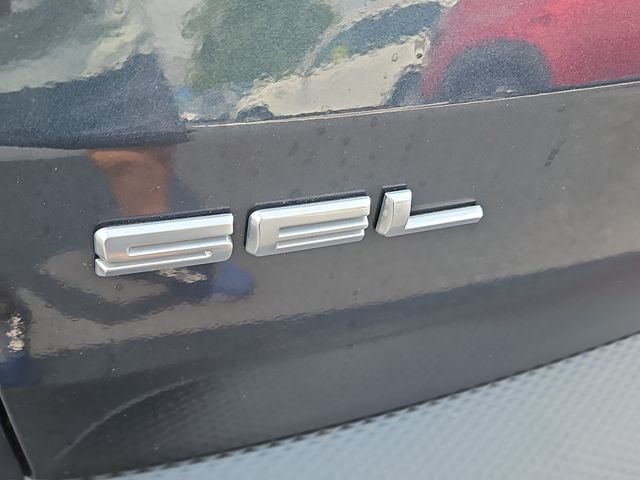 Used 2022 Blue Metallic Ford SEL image 5