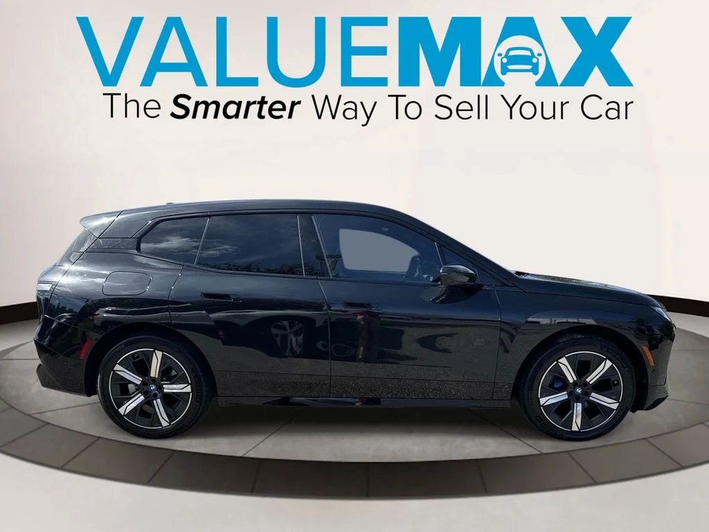 Used 2023 Black BMW xDrive50 image 2