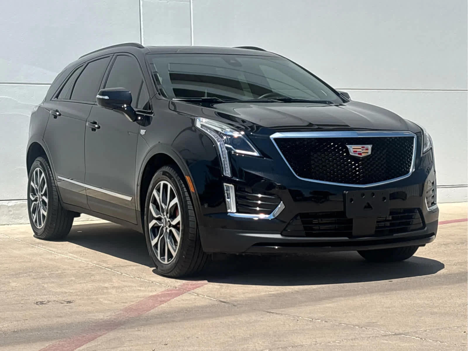 Used 2024 Stellar Black Metallic Cadillac Sport image 3