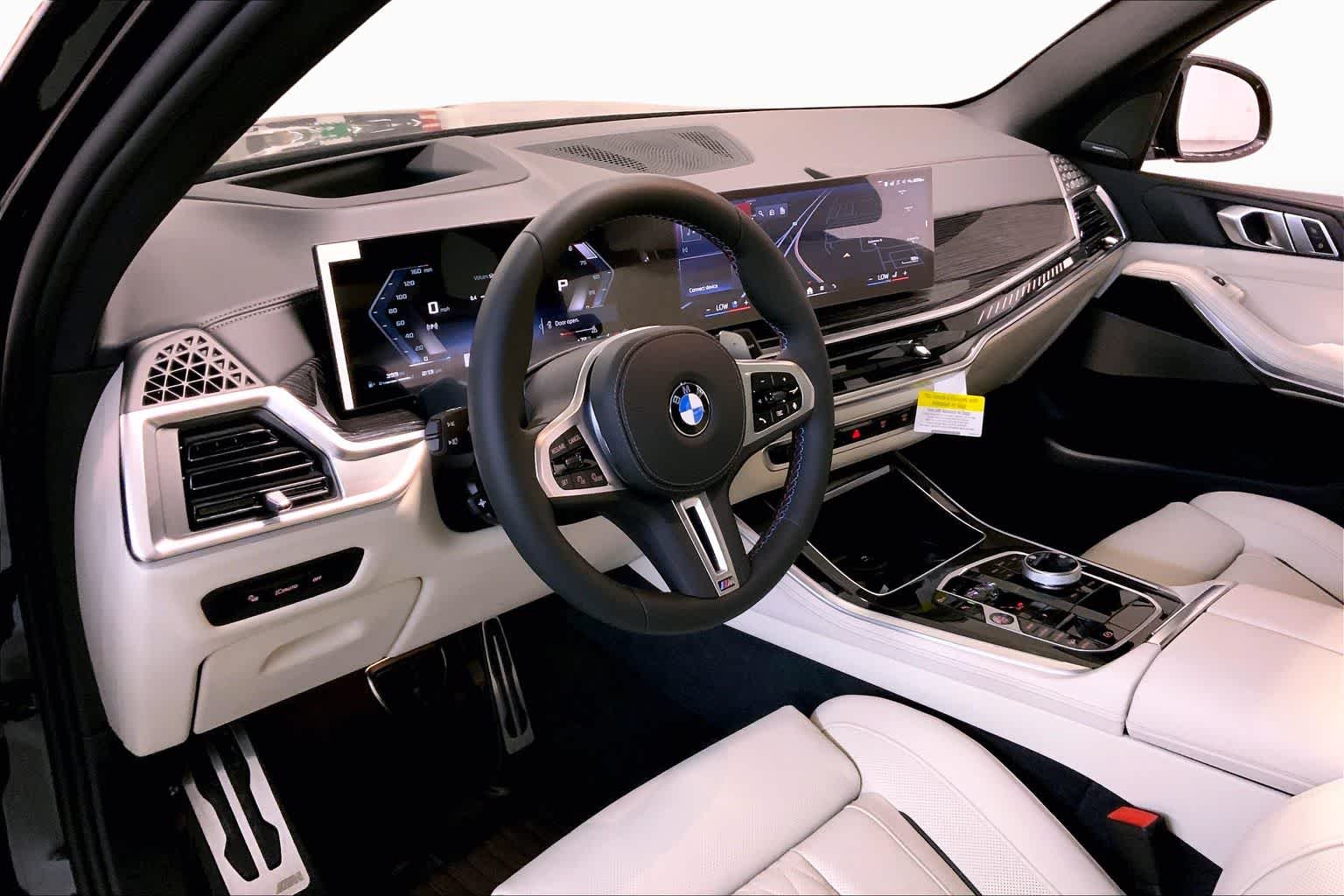 New 2026 Black Sapphire Metallic BMW M60i image 8