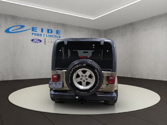 Used 2004 Beige Jeep Sport image 9