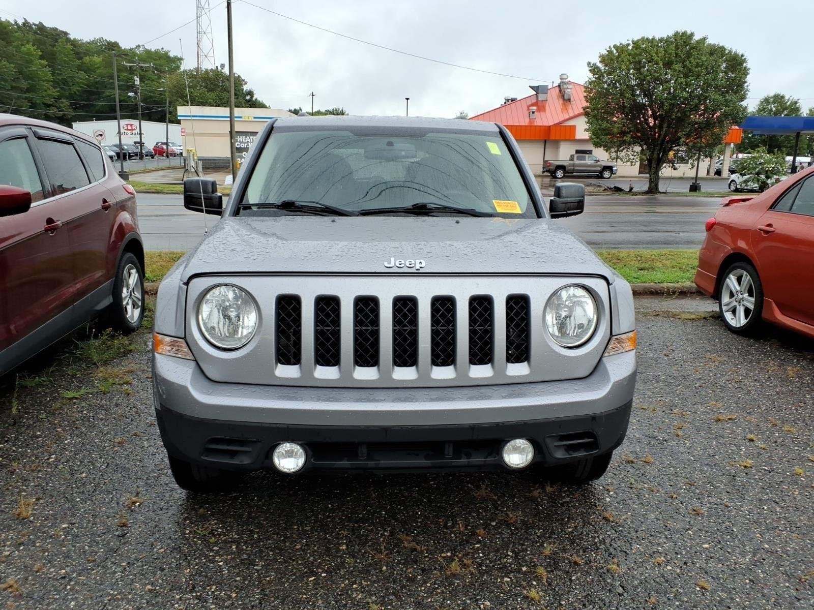 Used 2016 Deep Cherry Red Crystal Pearlcoat Jeep Sport image 2
