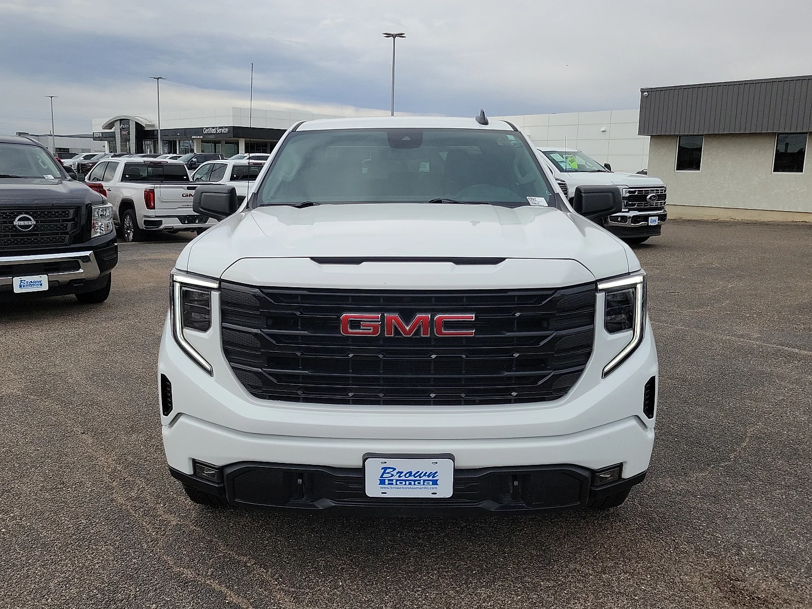 Certified Used 2024 Summit White GMC 4WD Crew Cab Short Box Elevation with 3SB image 3