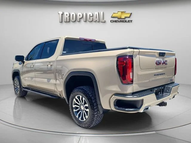 Used 2023 Desert Sand Metallic GMC AT4 image 3