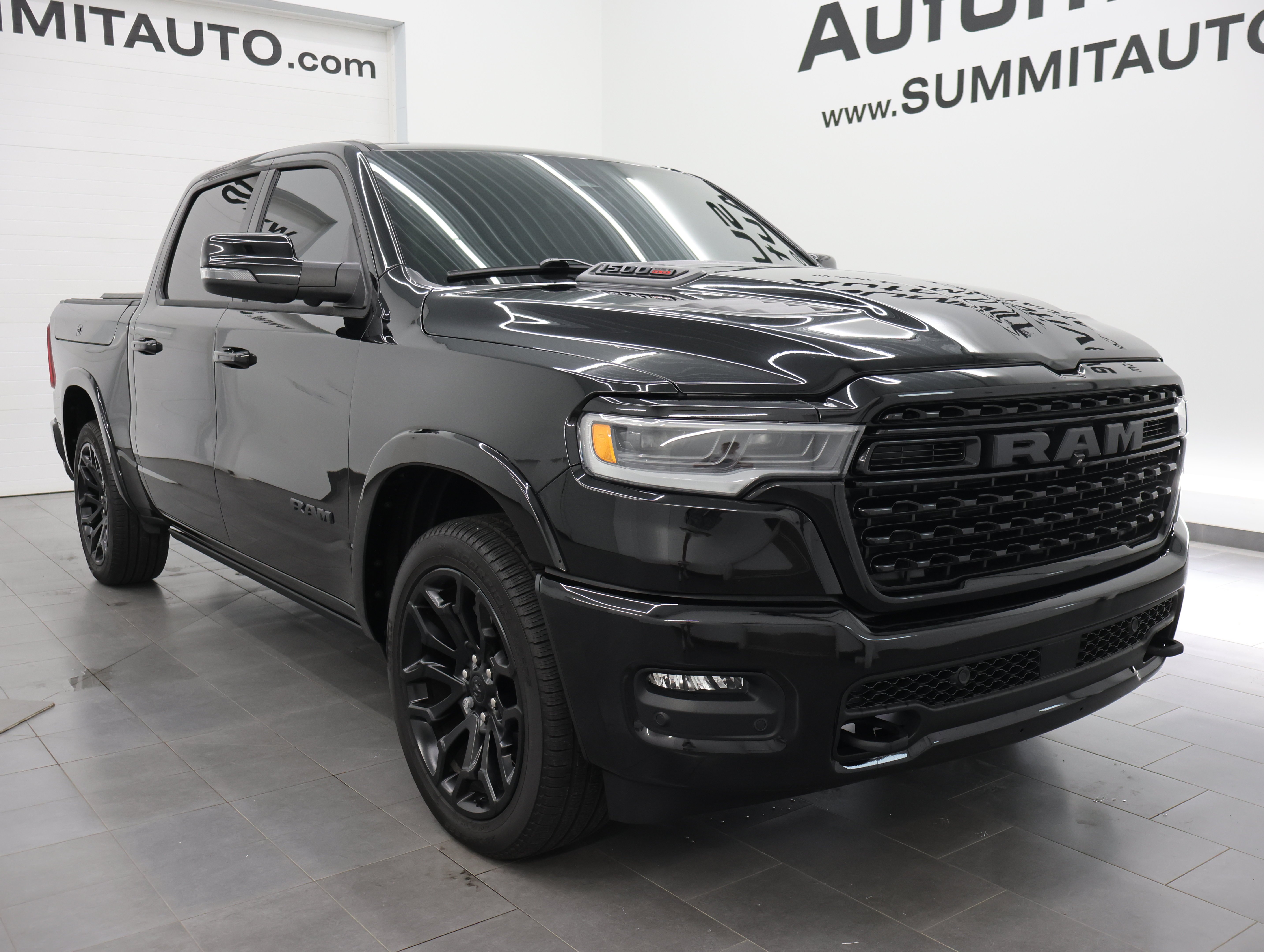 Used 2025 Diamond Black Crystal Pearlcoat Ram Limited image 2
