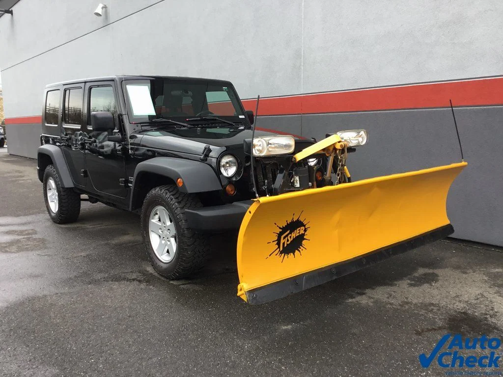 Used 2010 Black Jeep Unlimited Sport image 3