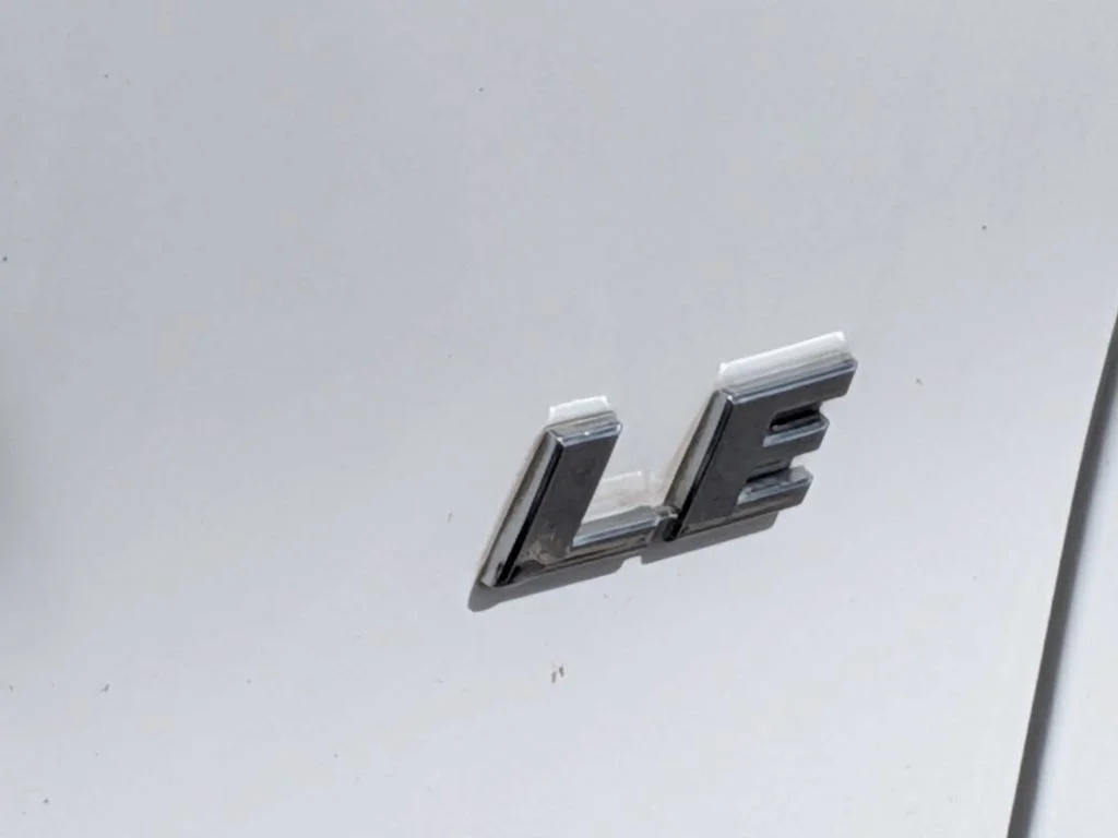 Used 2021 White Toyota LE image 13