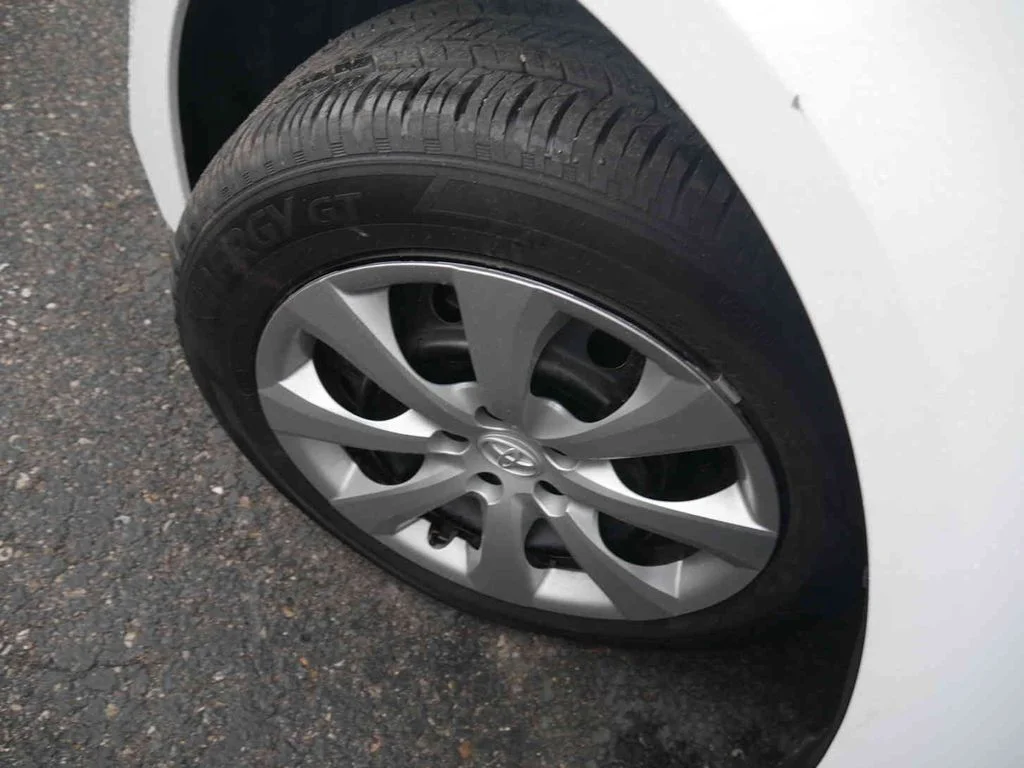 Used 2025 White Toyota LE image 9