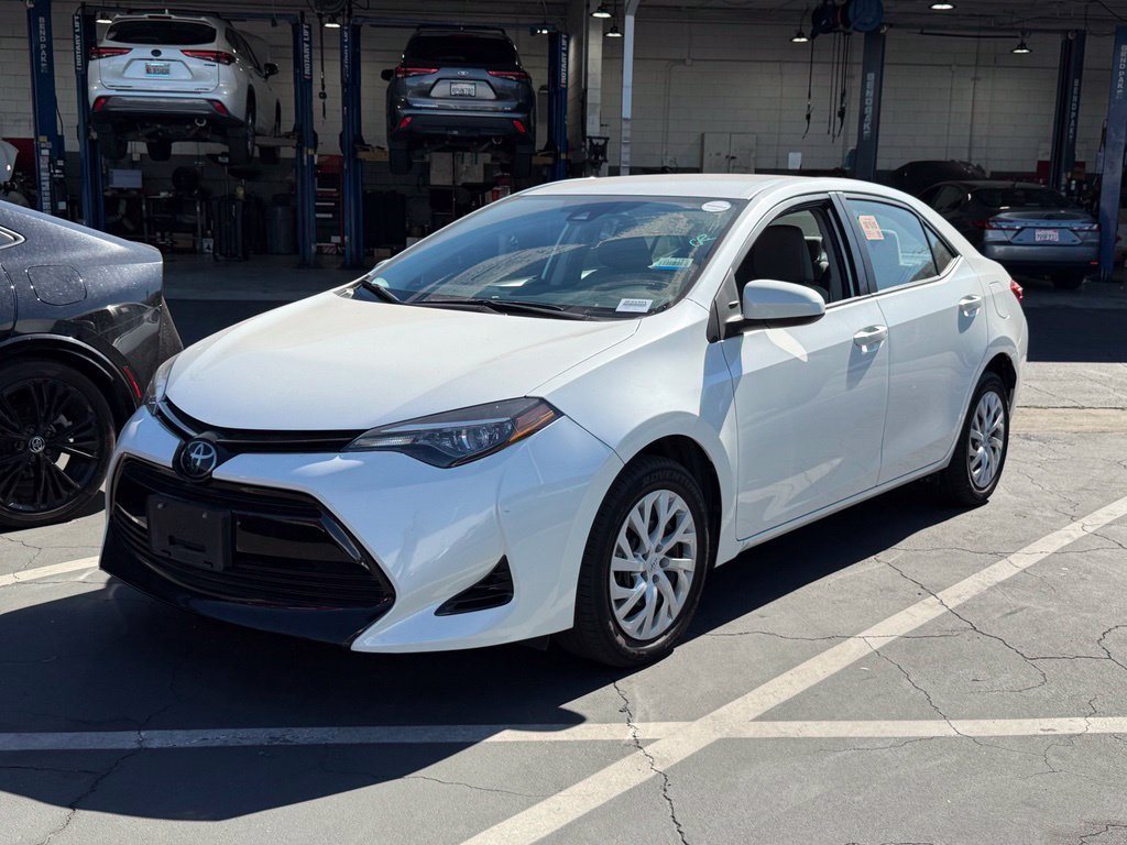 Certified Used 2018 White Toyota LE image 2