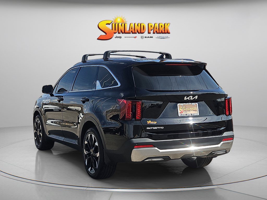 Used 2025 Ebony Black Kia EX image 4