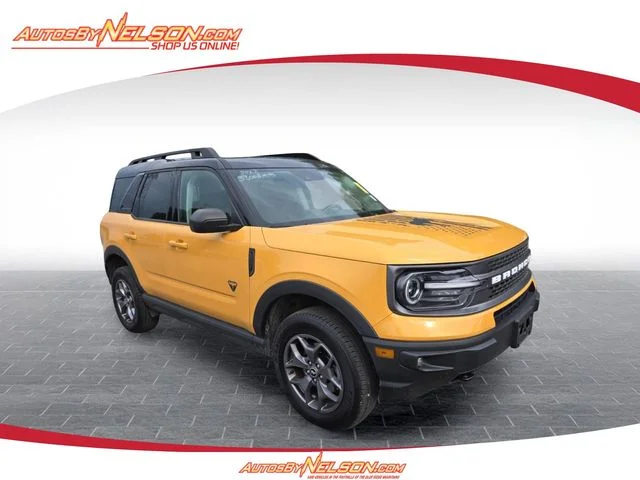 Used 2022 Orange Ford Badlands image 1