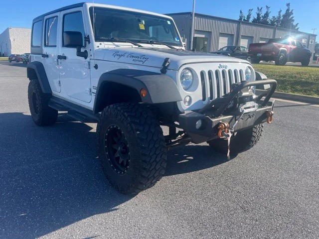Used 2018 White Jeep Unlimited Sport image 1